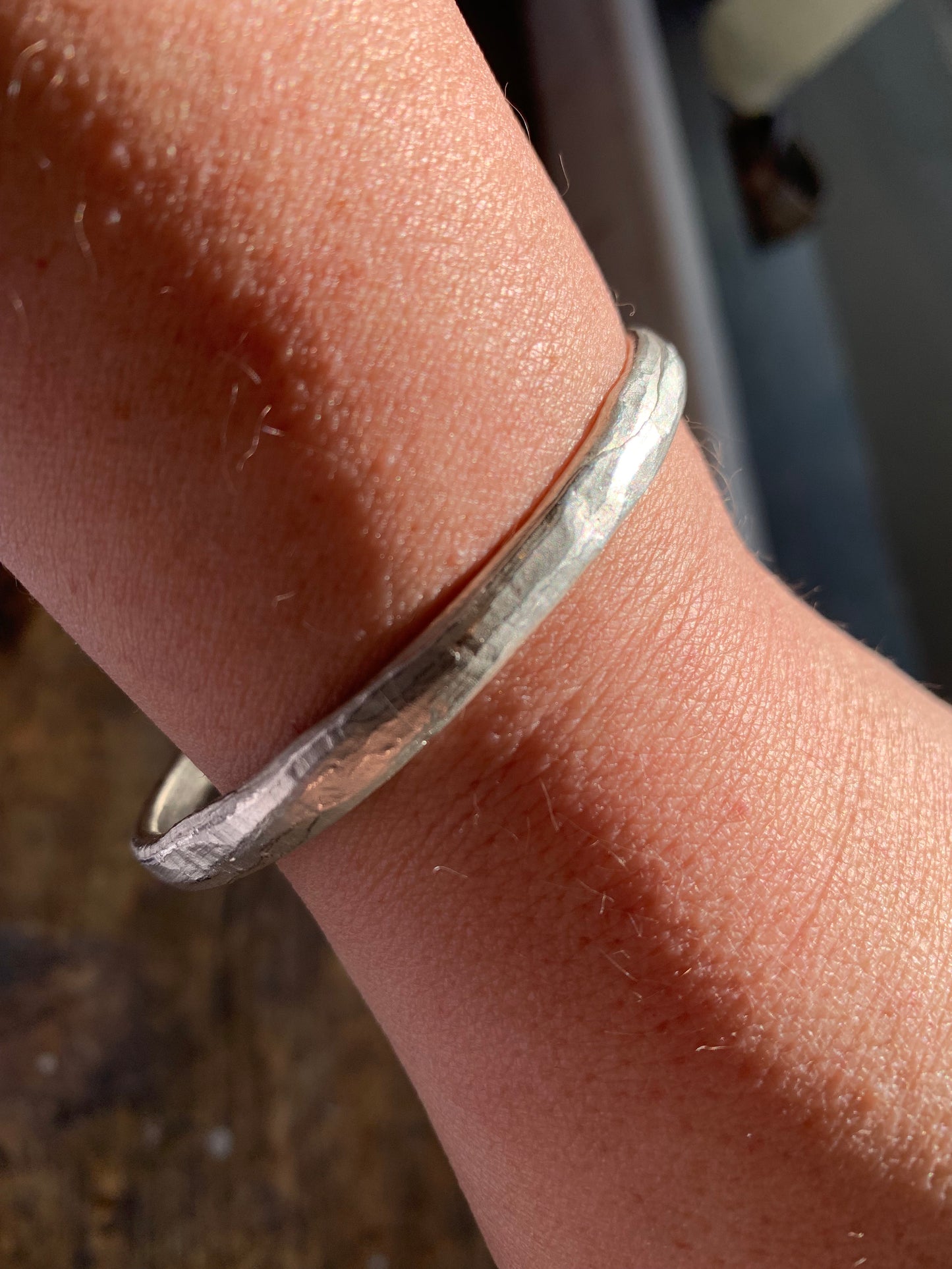 Organic textured silver bangle.