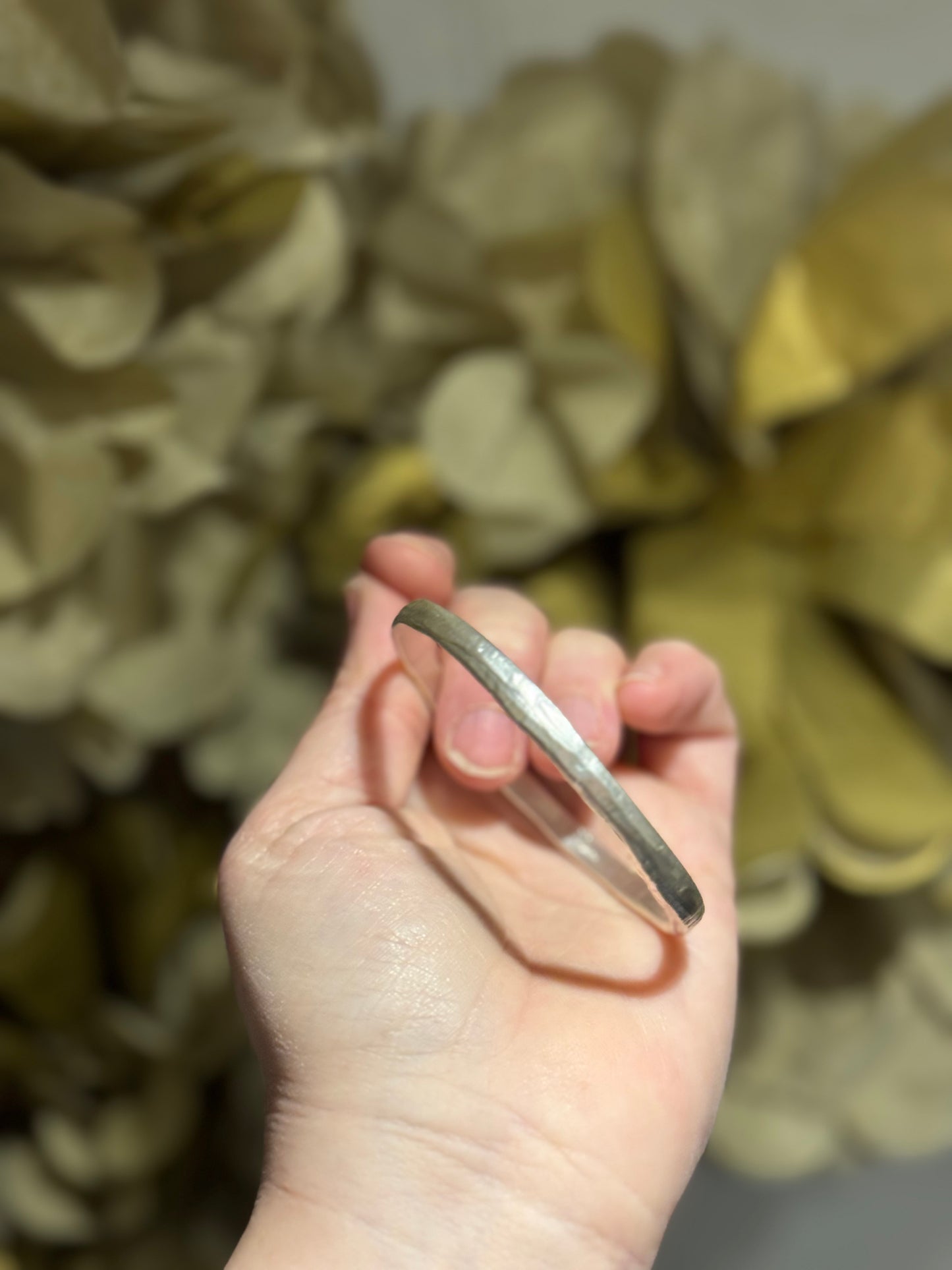 Organic textured silver bangle.