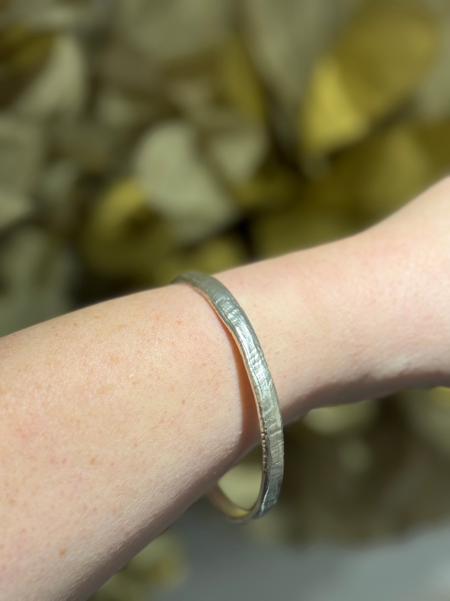 Organic textured silver bangle.