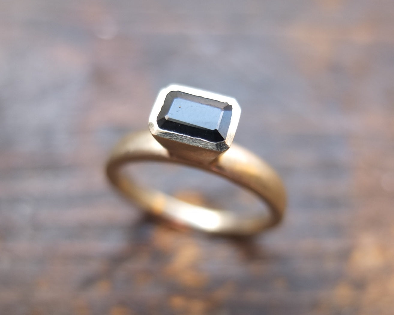 Black sapphire white gold ring.
