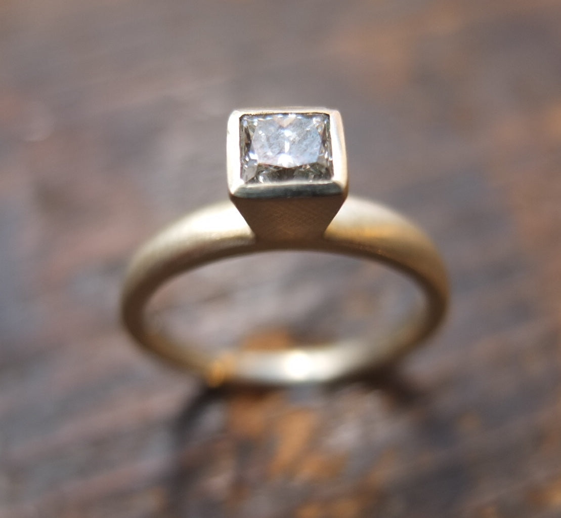 Diamond princess cut white diamond Solitaire ring.