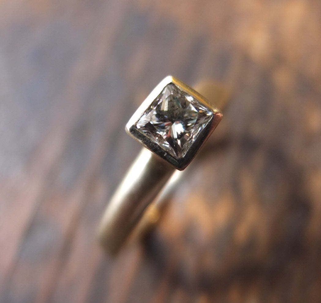 Diamond princess cut white diamond Solitaire ring.