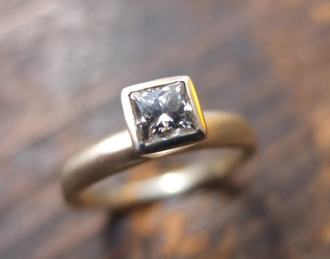 Diamond princess cut white diamond Solitaire ring.