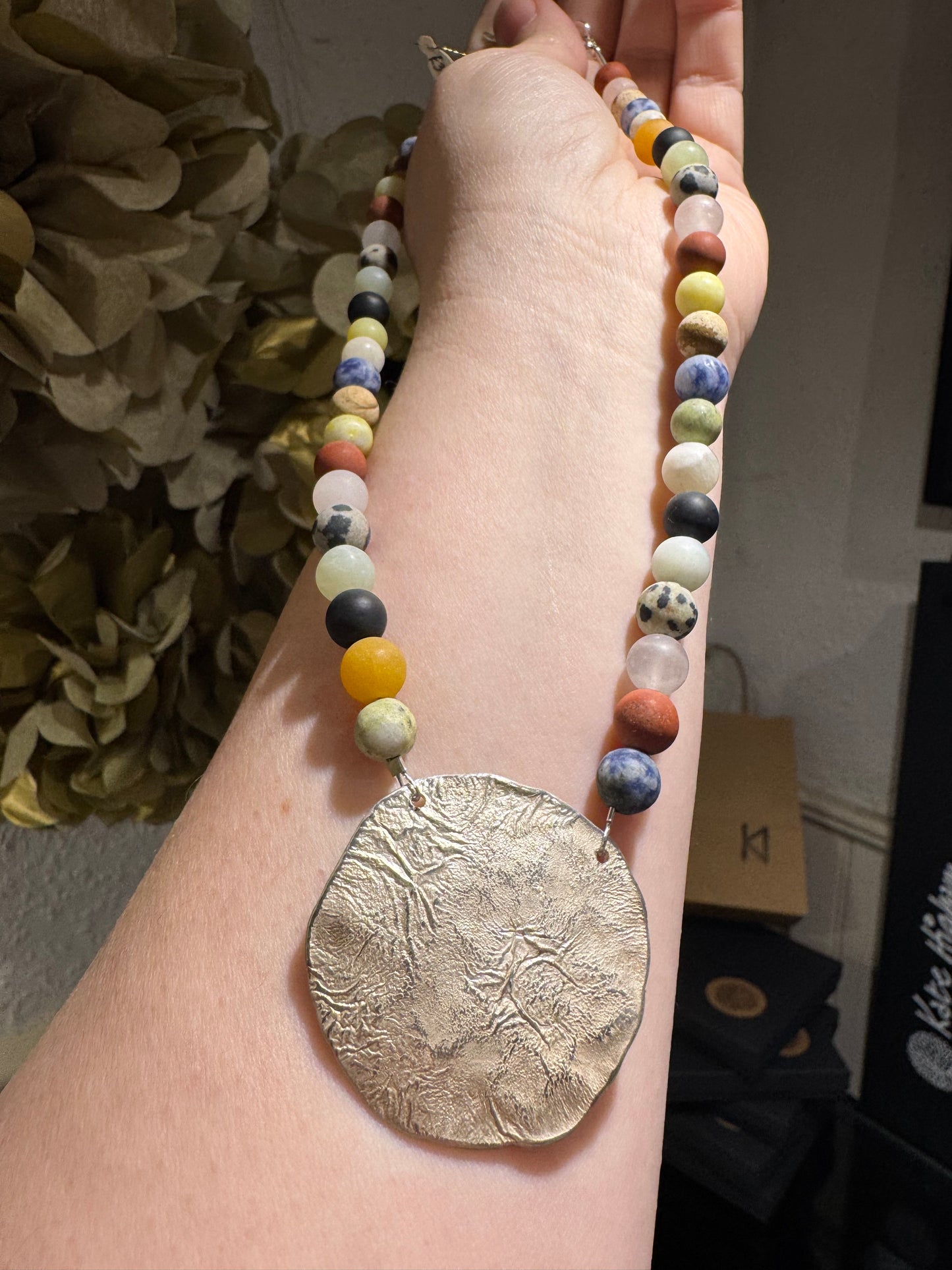 Mixed Gemstone matt bead necklace & large silver pendant.