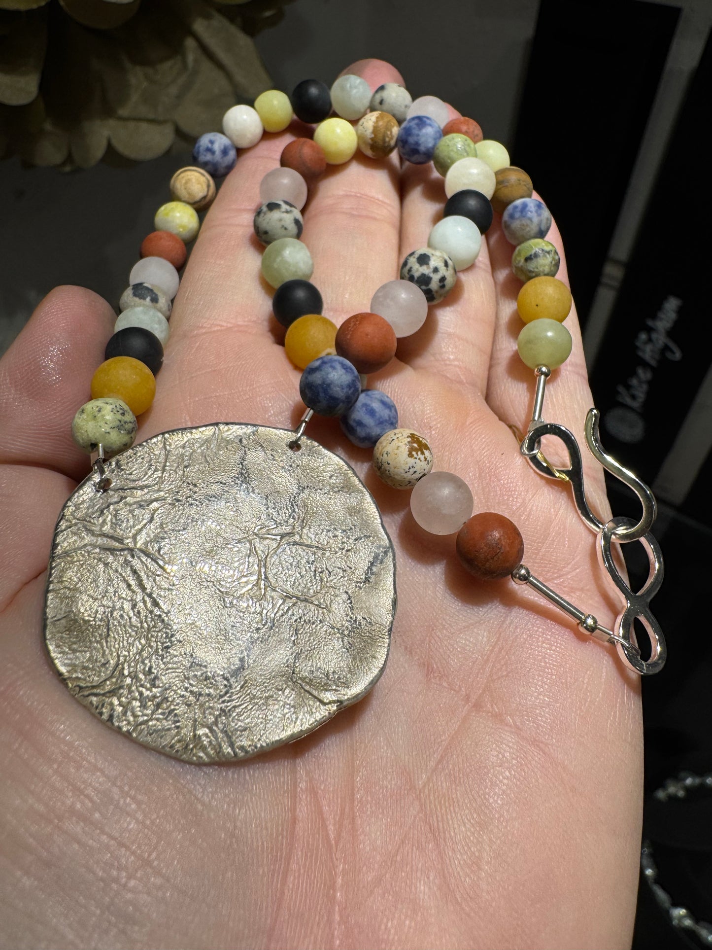 Mixed Gemstone matt bead necklace & large silver pendant.