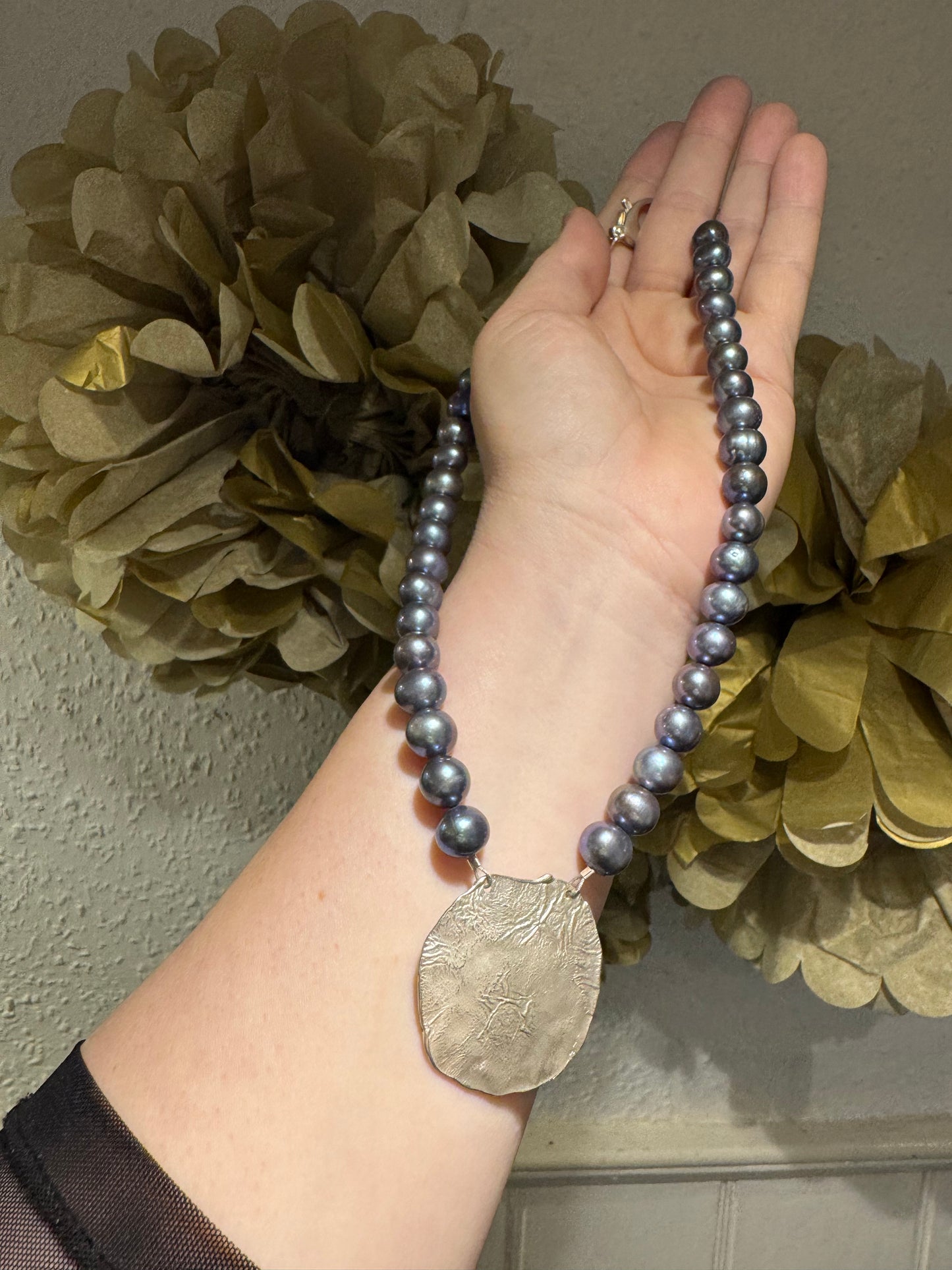 Black pearl silver pendant necklace.