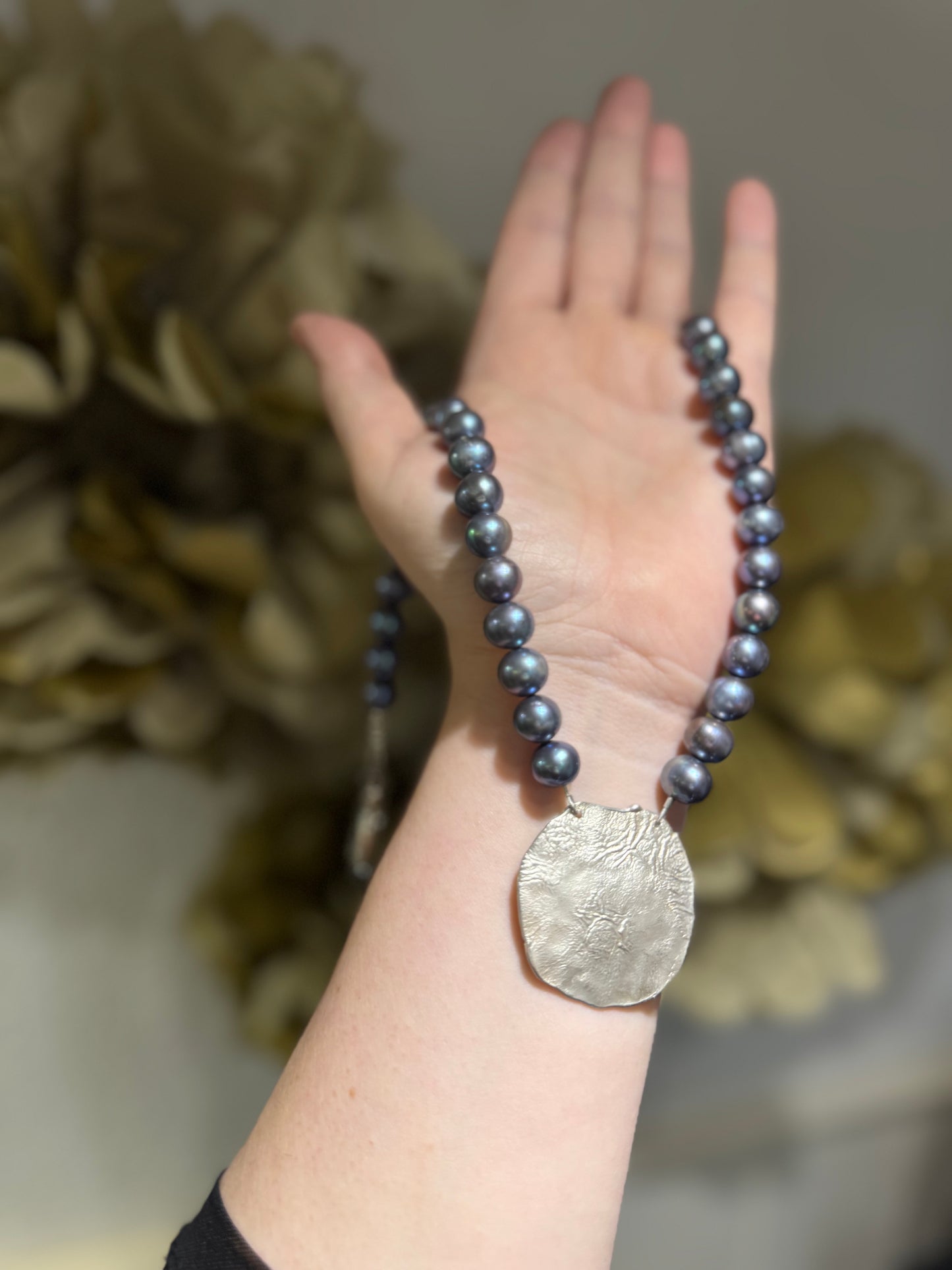 Black pearl silver pendant necklace.