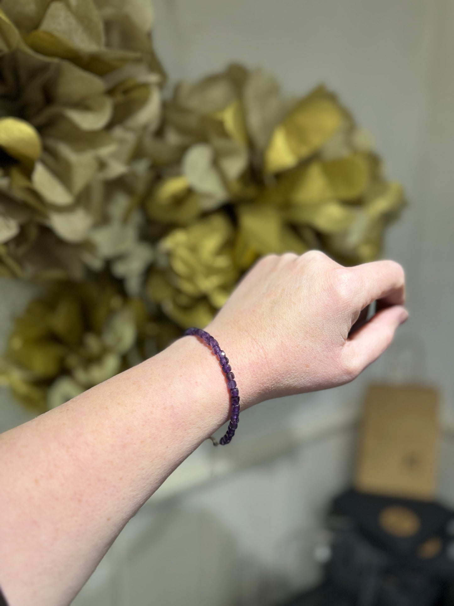 Amethyst sparkly bead magnetic silver bracelet.