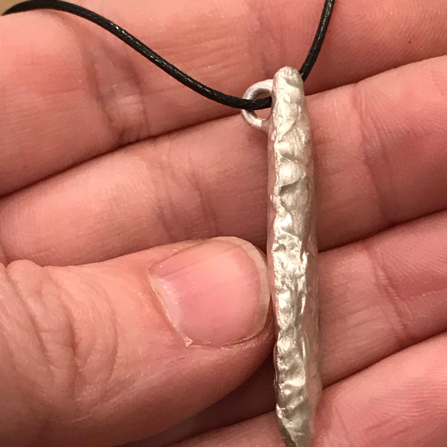 Ancient flint silver cast pendant
