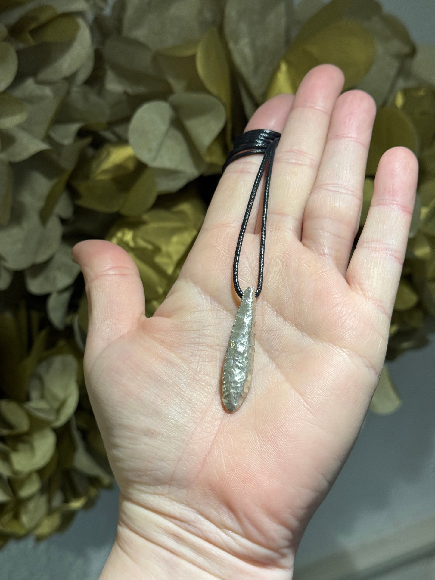 Ancient flint silver cast pendant