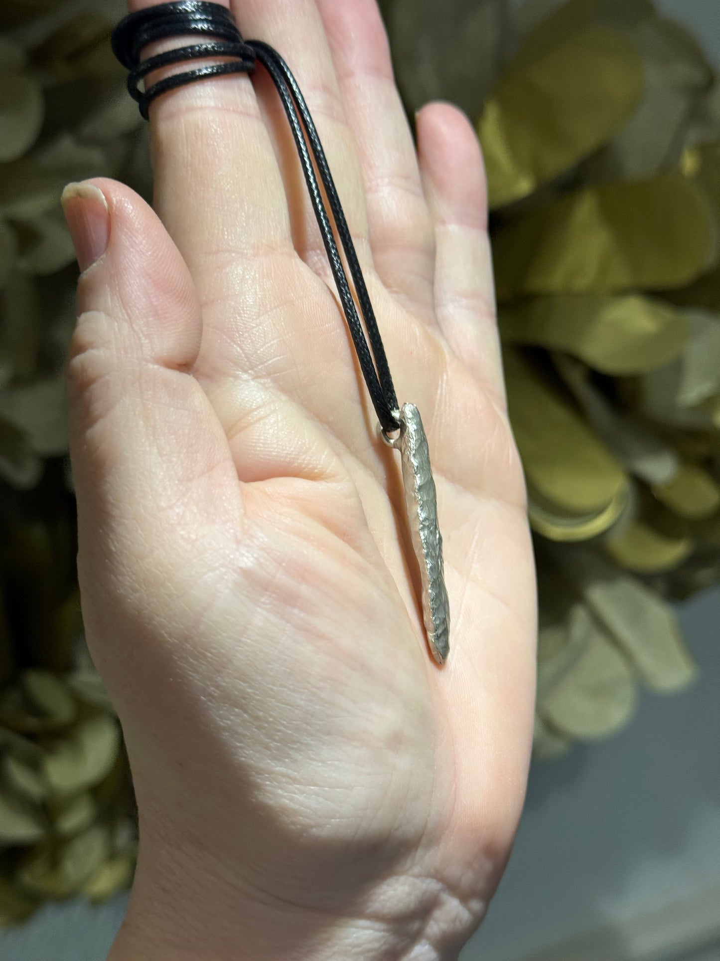 Ancient flint silver cast pendant