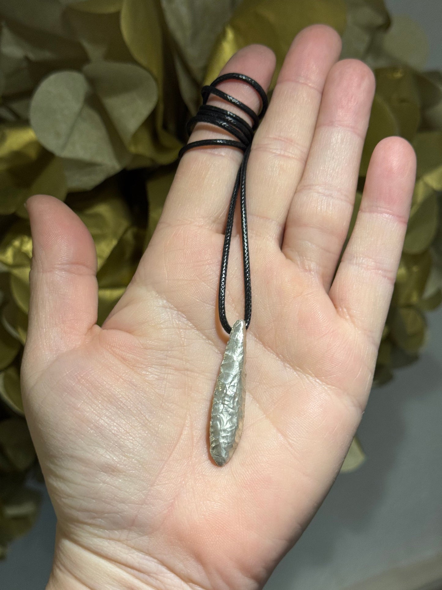 Ancient flint silver cast pendant