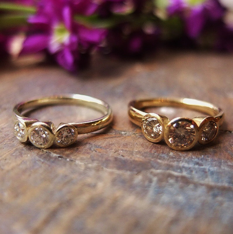 Champagne diamond trilogy 9ct yellow gold ring.