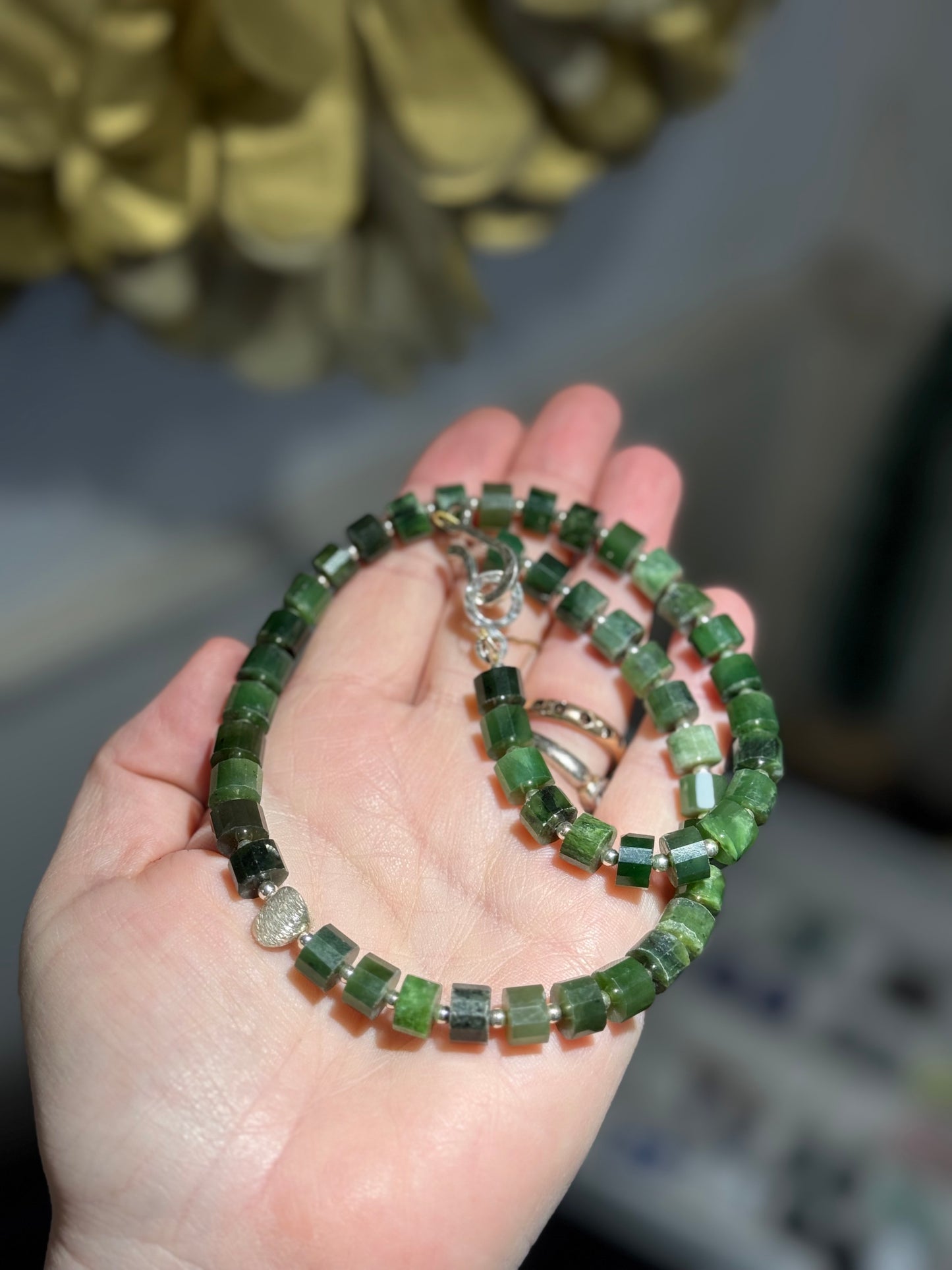 Faceted Jade silver detail necklace.