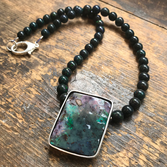 Australian boulder opal silver pendant on opal beads.