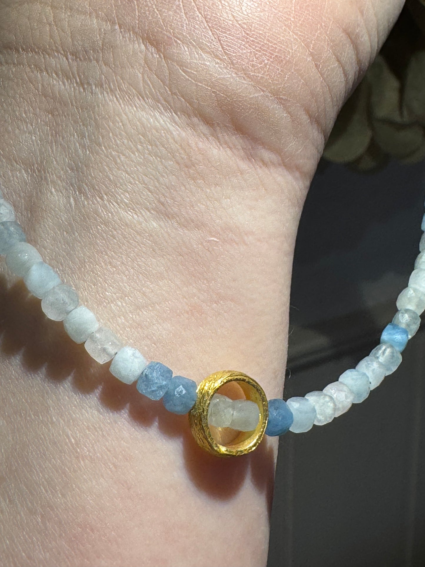 Aquamarine faceted cube silver-gilt ring necklace.