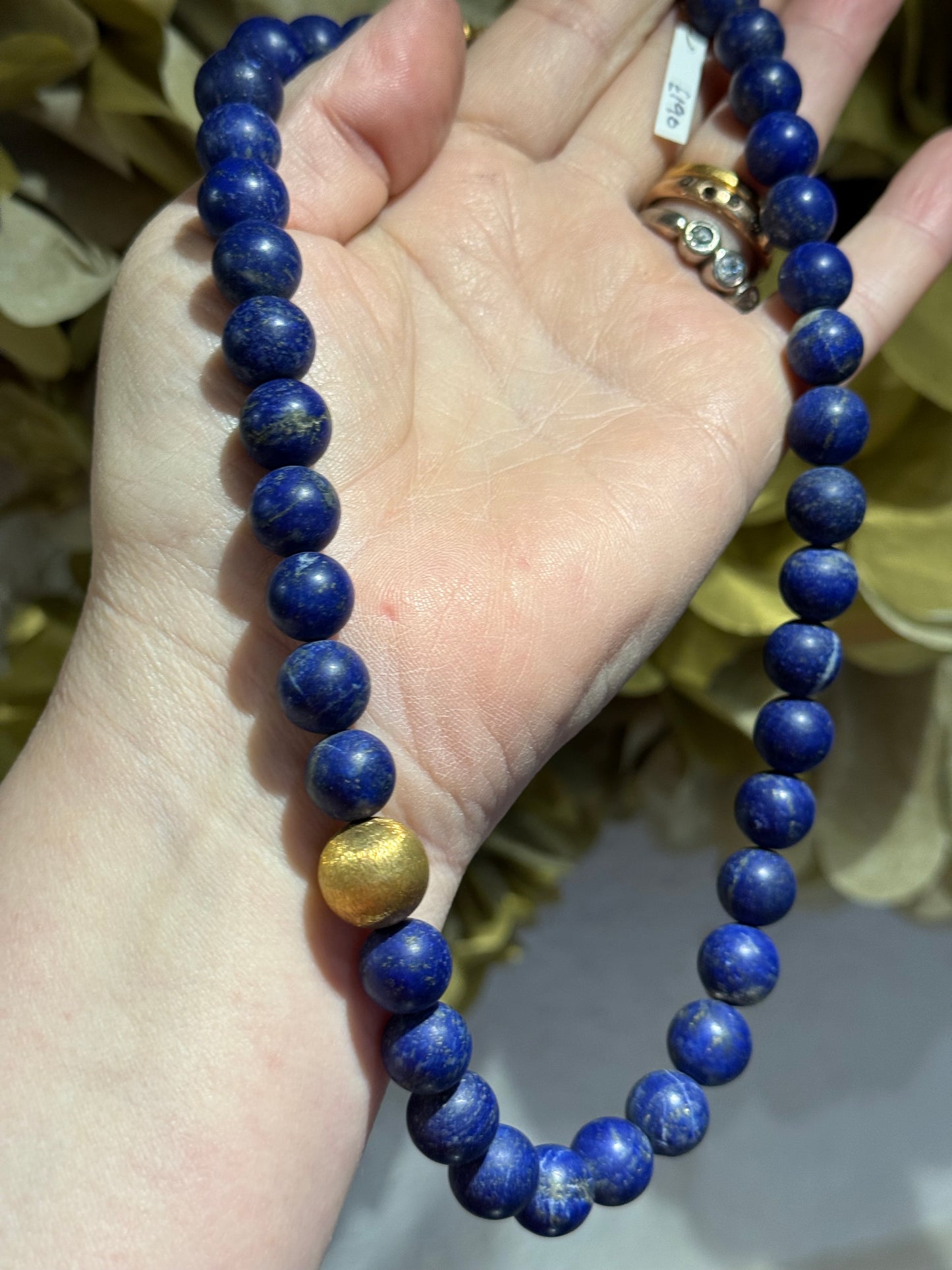 Lapis Lazuli silver-gilt round bead necklace.